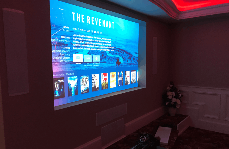Custom home cinema projector and screen installation.