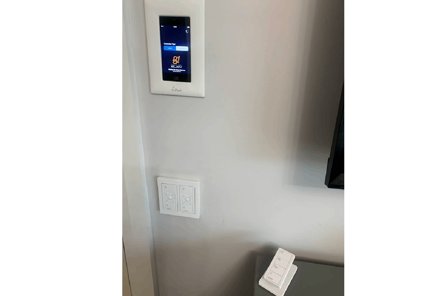 Wall mounted Elan home automation system touchscreen controller.